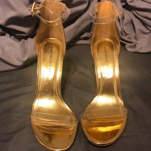 Gold and clear heel